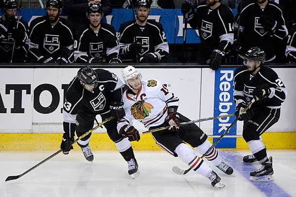 Jonathan Toews skating against the Los Angeles Kings